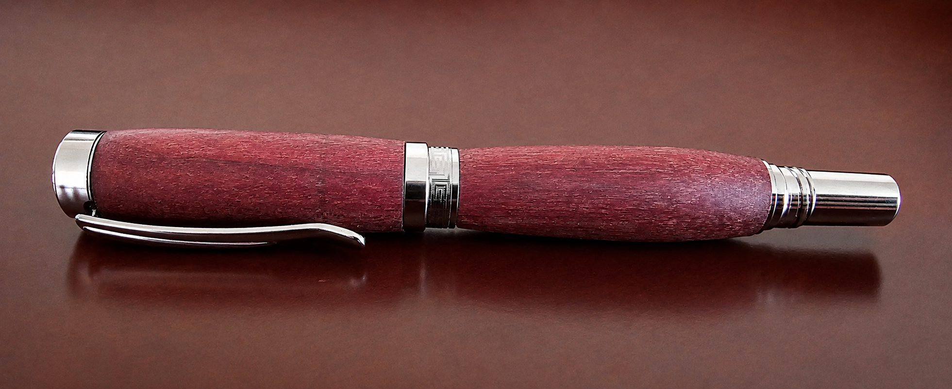 Purple Heart wood, high friction wax finish, a few years after it was made.